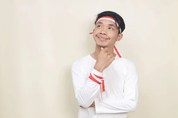 Portrait Asian Man Thinking Red White Ribbon Head — Stockfoto