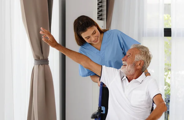 Nursing Nurse Caucasian Senior Man Wheelchair Looking Out Window Happy — Foto Stock