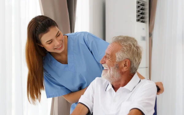 Nursing Nurse Caucasian Senior Man Wheelchair Looking Out Window Happy — Stock Photo, Image
