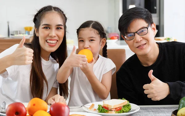 Happy Asian Family Spends Lunch Vegetables Fruit Dates Table Home — Fotografia de Stock
