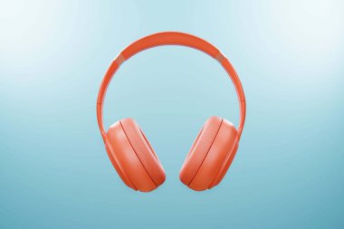 Modern Orange renk kulaklık, müzik dinlemek temiz bir mavi arka planda rahatlamak. Yaz tatili boyunca, 3D görüntüleme