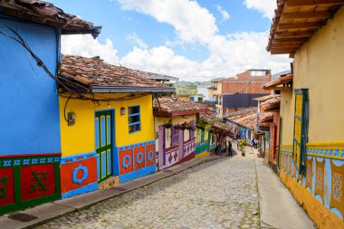 colorful street of guatape colonial town, colombia