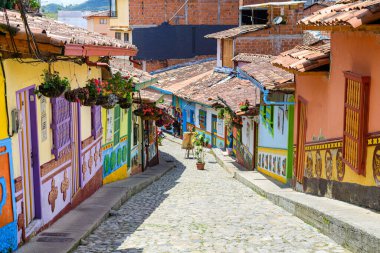 colorful street of guatape colonial town, colombia
