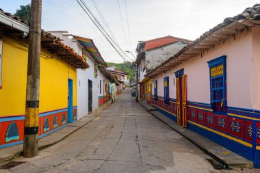 colorful street of guatape colonial town, colombia