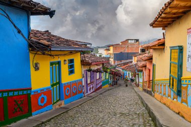 colorful street of guatape colonial town, colombia