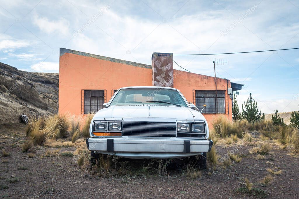 abandoned car next to route 66