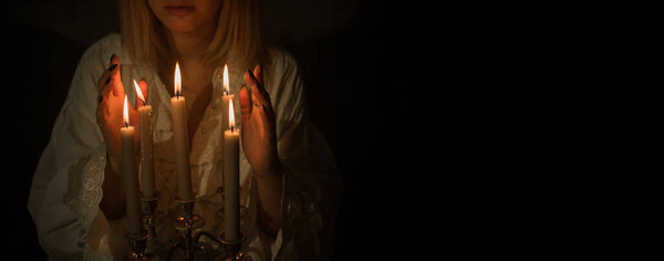 Magical candles for rituals and fate prediction, details of magic, occultism concept