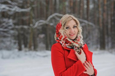 Plus size elegant woman at winter day in park walking outdoor, plump lady lifestyle. XXL lady in coat, magic cold Christmas time, warm clothes and fashion accessorize