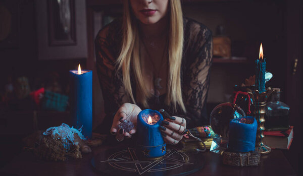 Concept of fortune telling and predictions of fate, magic and wicca elements on a table, witch look