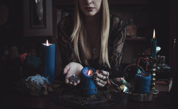 Concept of fortune telling and predictions of fate, magic and wicca elements on a table, witch look