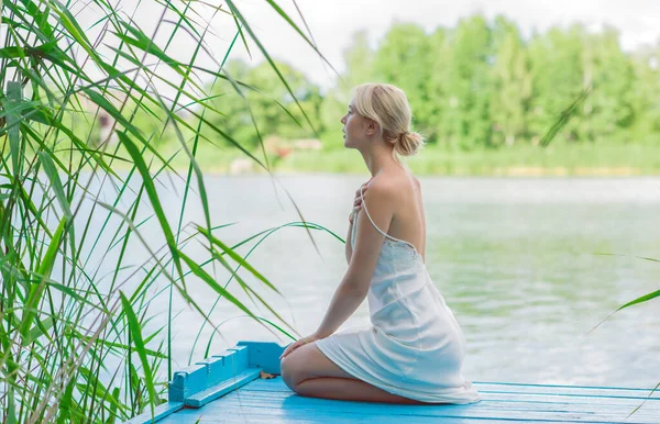Beautiful Morning Blonde European Young Woman White Silk Dress Relaxing — ストック写真