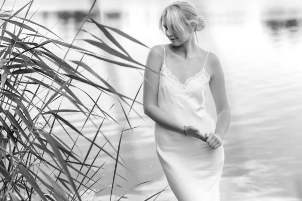 Beautiful Morning Blonde European Young Woman White Silk Dress Relaxing — Stockfoto