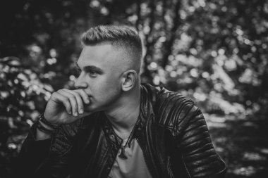  Young European man with a sad philosophical mood. The concept of life, problems and depression. Crisis of young age