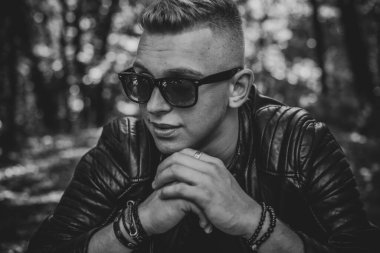  Young European man with a sad philosophical mood. The concept of life, problems and depression. Crisis of young age