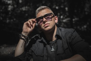  Young European man with a sad philosophical mood. The concept of life, problems and depression. Crisis of young age