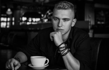  Young European man with a sad philosophical mood. The concept of life, problems and depression. Crisis of young age