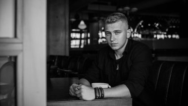 Young European man with a sad philosophical mood. The concept of life, problems and depression. Crisis of young age