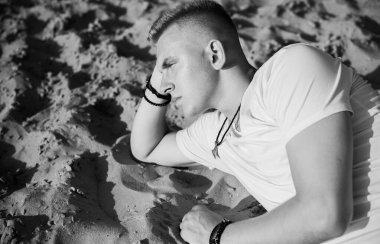  Young European man with a sad philosophical mood. The concept of life, problems and depression. Crisis of young age