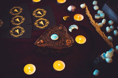 Magical attribute of modern witch, witchcraft concept. Tarot cards and other rituals. Illustrative editorial. Europe, Ukraine, Kiev. August 24