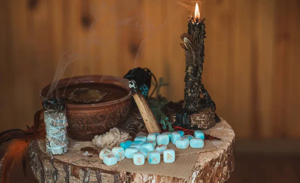 Candle burns on the altar, candles magic, clean aura and negative energy, wicca concept