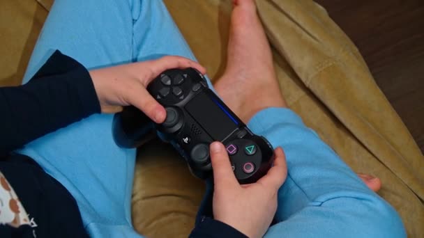 Girl Plays Playstation Dualshock Controller — Stock Video