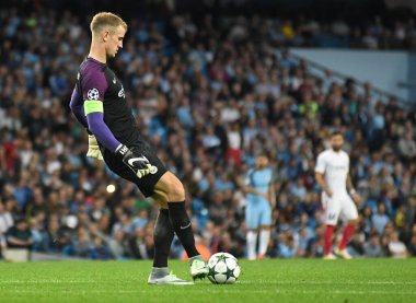 MANCHESTER, ENGLAND - 24 AĞUSTOS 2016: Joe Hart of City, Etihad Stadyumu 'nda Manchester City (Engalnd) ile FCSB (Romanya) arasında oynanan 2016 / 17 UEFA Şampiyonlar Ligi maçının ikinci ayağı sırasında çekildi. Telif Hakkı: Cosmin Iftode / Picstaff