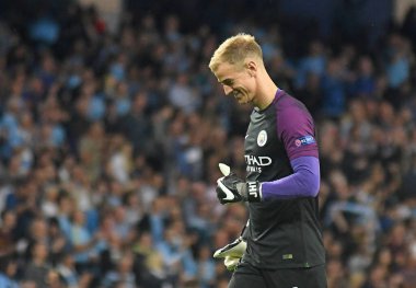 ?MANCHESTER, ENGLAND - 24 AĞUSTOS 2016: Joe Hart of City, Etihad Stadyumu 'nda Manchester City (Engalnd) ile FCSB (Romanya) arasında oynanan 2016 / 17 UEFA Şampiyonlar Ligi maçının ikinci ayağı sırasında çekildi. Telif Hakkı: Cosmin Iftode / Picstaff
