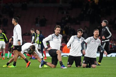 LONDON, ENGLAND - MARCH 7, 2017: Bayern players warm up prior to the second leg of the UEFA Champions League Round of 16 game between Arsenal FC and Bayern Munchen at Emirates Stadium. Copyright: Cosmin Iftode/Picstaff