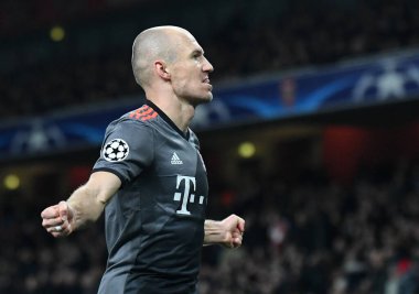 LONDON, ENGLAND - 7 Mart 2017: Bayern 'li Arjen Robben, Arsenal FC ve Bayern Munchen arasında oynanan 16 maçlık UEFA Şampiyonlar Ligi ikinci turunda attığı golü kutluyor. Telif Hakkı: Cosmin Iftode / Picstaff