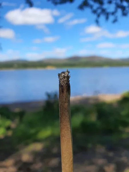 Detail Lit Marijuana Weed Joint Pictured Outdoors Lake — Stockfoto
