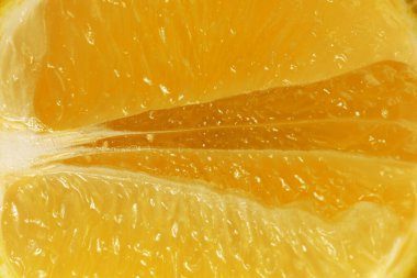 Olgun portakalın yarısı. Doku, arkaplan, makro