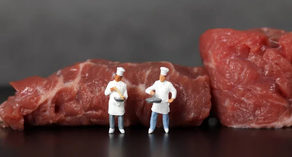 Uncooked Beef Two Miniature Chefs Miniature People Uncooked Beef Business Stock Picture