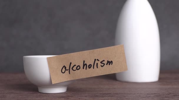 Alcoholism Text Paper Glass Bottle Concept Alcoholism Warning — Vídeos de Stock