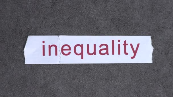 Piece Paper Says Inequality Text Paper Blew Away Wind — Stockvideo