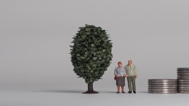 Miniature People Concept Aging Society Miniature Old Couple Standing Next — Video Stock