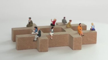 Hashtag and variety of miniature people. Business concept with miniature people.