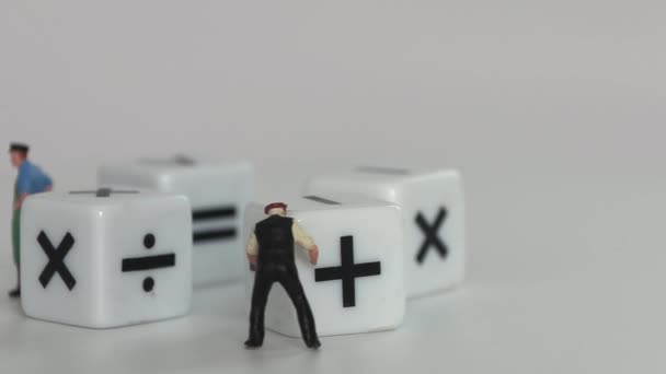 Four White Dice Mathematical Math Symbols Business Concept Miniature People — Stockvideo