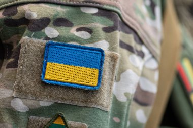 Kyiv, Ukraine - August 31 2022: Flag of Ukraine, Ukrainian Army or Armed Forces on a patch of a soldier military uniform, close up
