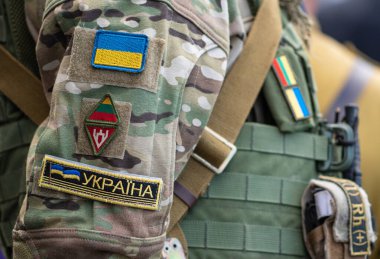 Kyiv, Ukraine - August 31 2022: Flag of Ukraine, Ukrainian Army or Armed Forces on a patch of a soldier military uniform, close up