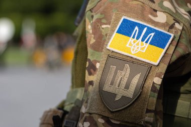 Kyiv, Ukraine - August 31 2022: Flag of Ukraine, Ukrainian Army or Armed Forces on a patch of a soldier military uniform, close up