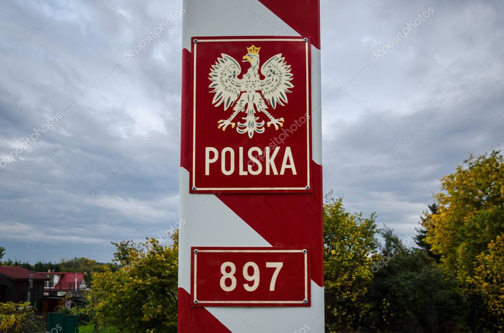 SWINOUJSCIE - WEST POMERANIA / POLAND - 2021: Polish border post with the national emblem