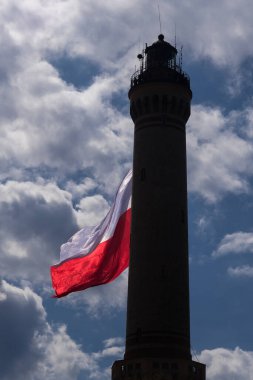 STATE FLAG - Flag of Poland at the lighthouse in Swinoujscie