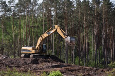 EXCAVATOR - İnşaat alanında çalışan araç