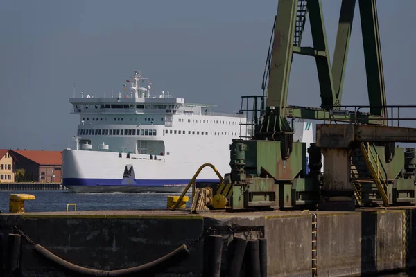 stock image SWINOUJSCIE, WEST POMERANIAN - POLAND - 2022: Passenger ferry goes along the port canal to terminal