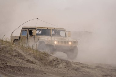 BORNE SULINOWO, WEST POMERANIAN - POLAND - 2022: High Mobility Multipurpose Wheeled Vehicle - Ride a military vehicle of the reconstruction group of the American army