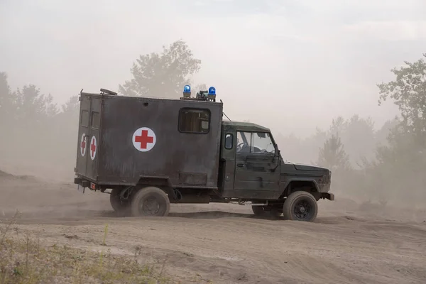 MILITARY AMBULANCE - Polish all-terrain vehicle on a dirt road
