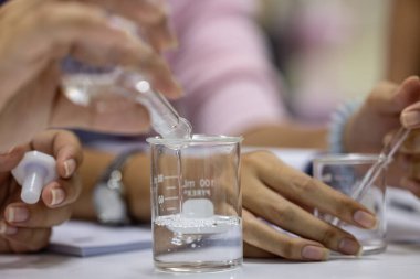 Scientist working Titration technique in the laboratory.
