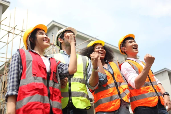 engineering team or worker team they are working at construction site