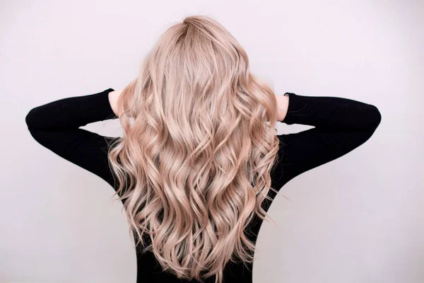 Female Back Long Curly Natural Blonde Hair Black Dress Grey Royalty Free Stock Images