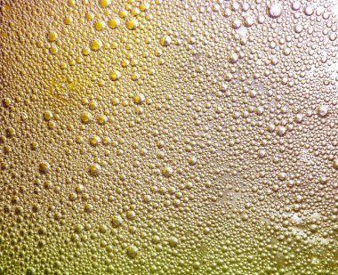 Parlak daireli soyut bir arka plan. Renkli bir görüntü, suyun üstünde yağ damlaları. Sıvı soyutlama. 